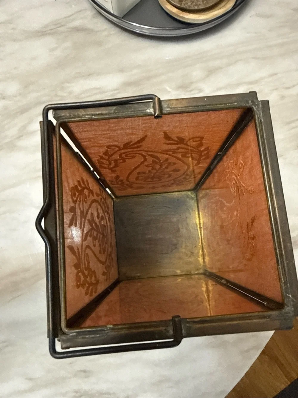 Square lantern paper thin stitching inside glass